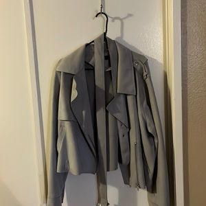 Grey blazer jacket with detachable belt.
